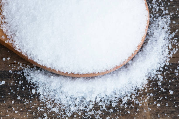 istock Salt in a Wooden Spoon 927460890