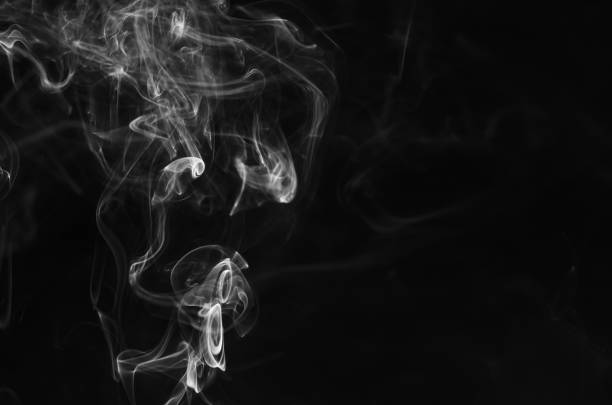 istock abstract movement of white smoke in dark background. 927469968
