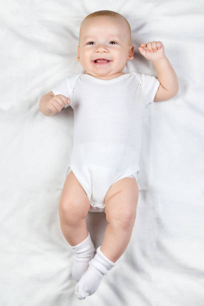 istock Laughing four-month baby 927473712