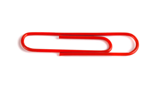 istock Red paper clip isolated on white background 927482130