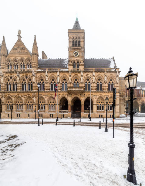 istock Northampton Guildhall Neo Gothic Building on Cloudy Winter Snowy Day 927488188