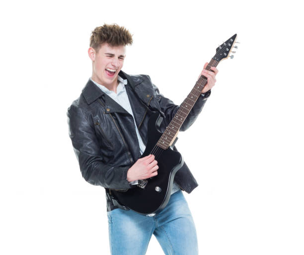istock Handsome young male rocking out with a guitar 927488394