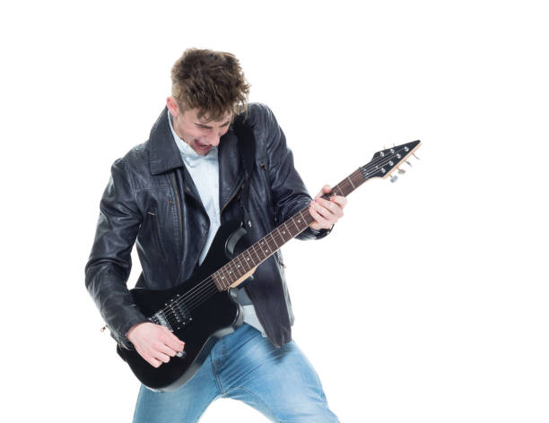 istock Handsome young male rocking out with a guitar 927488634