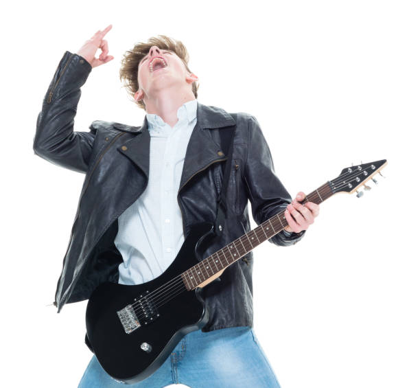 istock Handsome young male rocking out with a guitar 927491362