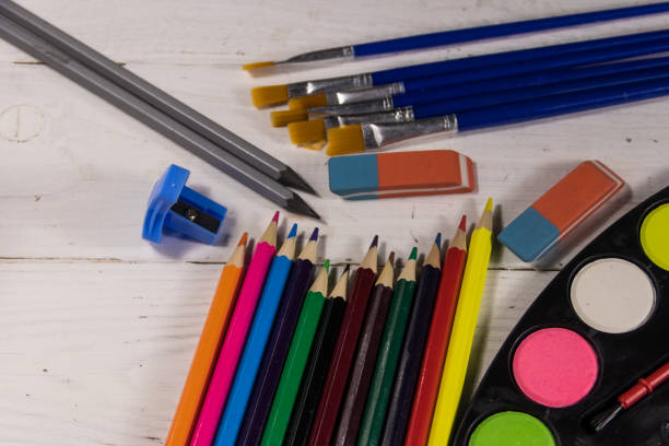 istock Set of drawing tools on white wooden background 927496866