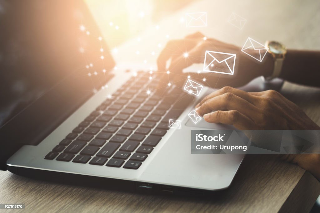 Email concept Business woman hand using Laptop pc with email icon,Email concept E-Mail Stock Photo