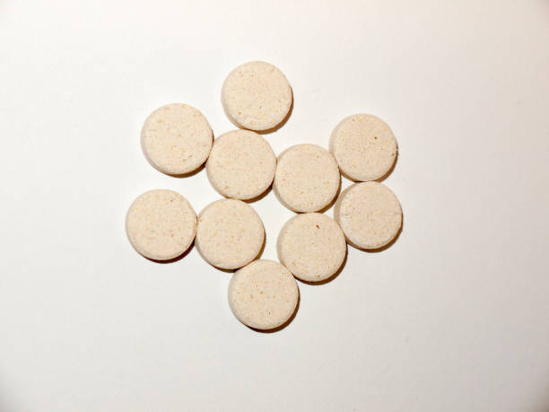 istock white pale circle tablets pills group of white background studio 927513622