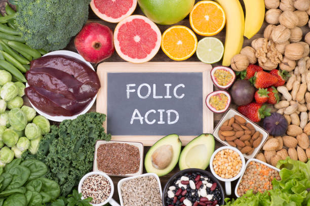 Food rich in folic acid Food rich in folic acid, top view folic acid stock pictures, royalty-free photos & images