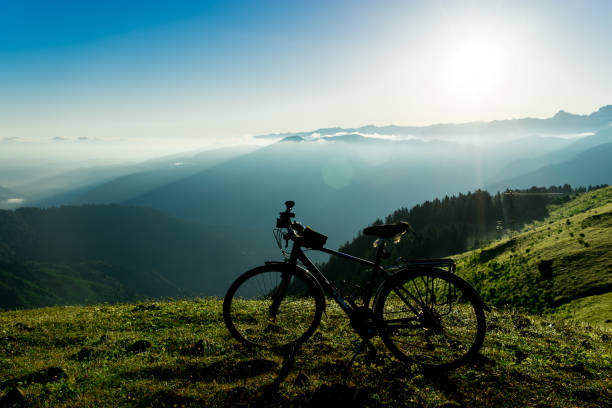 Bike in Bicycle Camp Against Sunset Sky Background