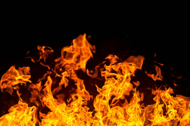 istock Blazing fire border isolated on black 927525222