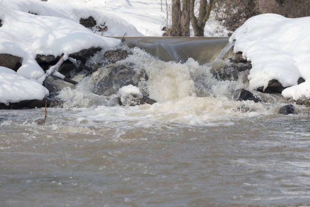 istock Melting snow and rising river water level 927538778