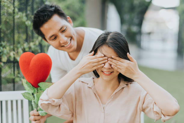 istock Asian man surprise his girlfriend 927545918