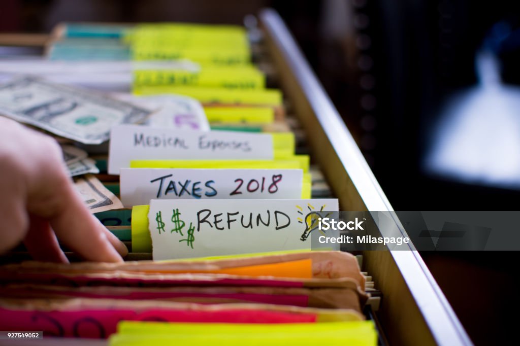 Ideas de reembolso de impuestos y preparación de declaración de impuestos - Foto de stock de Formulario de impuestos libre de derechos