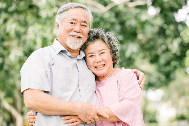 istock Happy Asian senior couple having a good time 927549450
