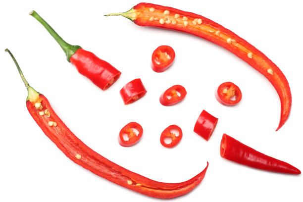 istock sliced red hot chili peppers isolated on white background top view 927549626