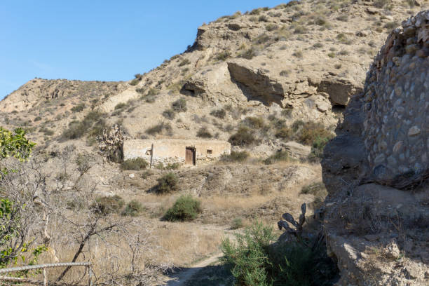 istock Andalusian landscape with cave house, Spain on a day in spring 927570454