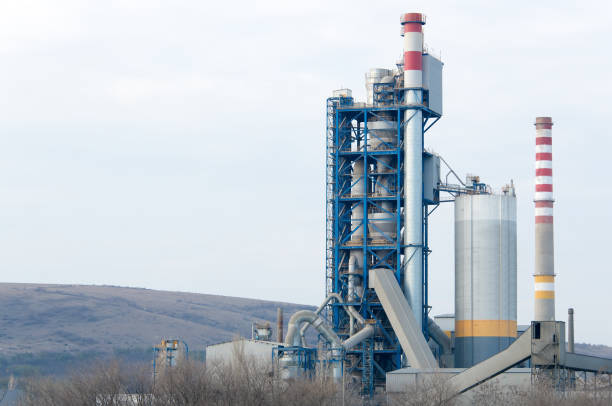 Industrial plant for the production of cement. Industrial plant for the production of cement. cement factory stock pictures, royalty-free photos & images