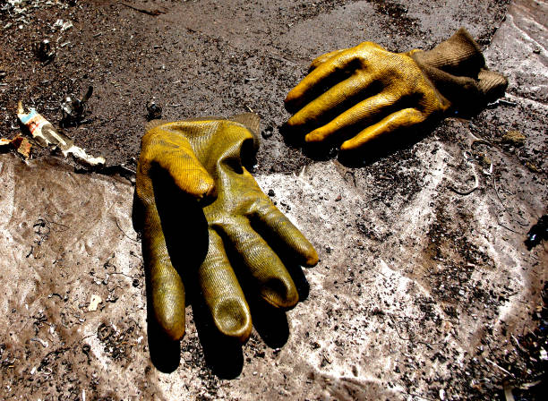 istock Yellow gloves on the floor 927579130