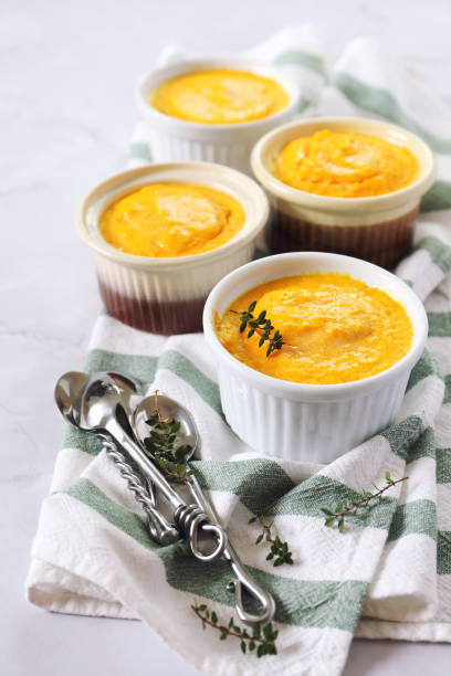 istock Four servings of carrot flan 927591648