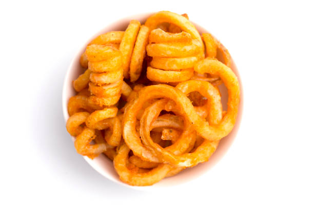 istock Seasoned Curly Fries in a White Bowl 927594108