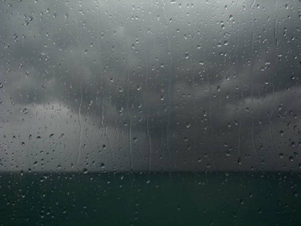Rain, sea and clouds behind a window, Alpes-Maritimes