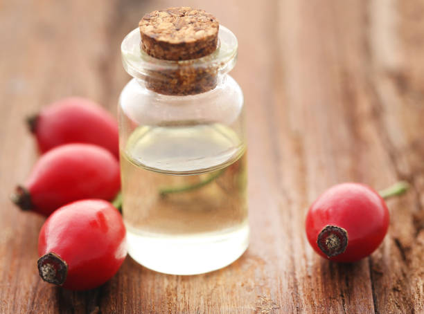 istock Medicinal Rose hips with essential oil 927603054