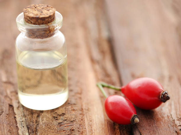 istock Medicinal Rose hips with essential oil 927603062