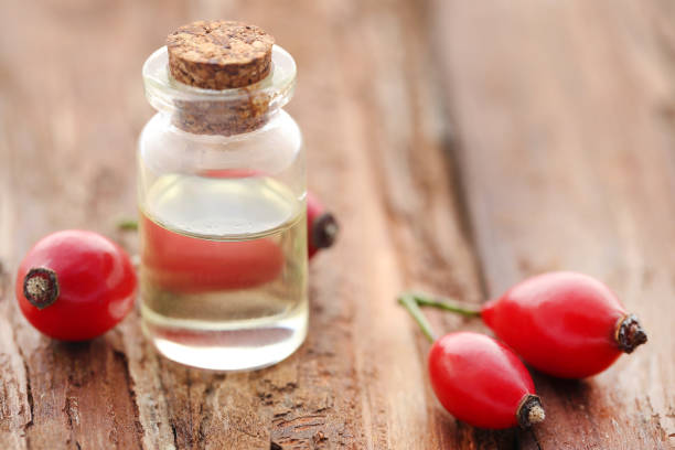 istock Medicinal Rose hips with essential oil 927603068