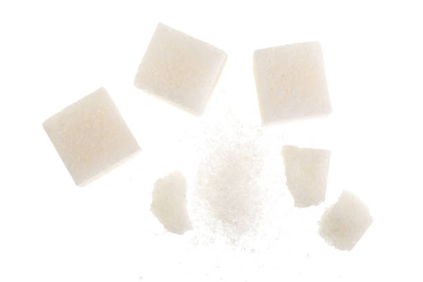 istock Sugar cubes isolated on white background, close up. Top view. Flat lay 927604184