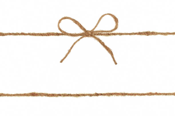 istock Vintage burlap rope bow isolated on white background 927605176