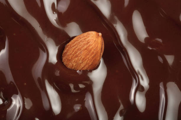 istock Melted chocolate swirl as a background closeup 927606116