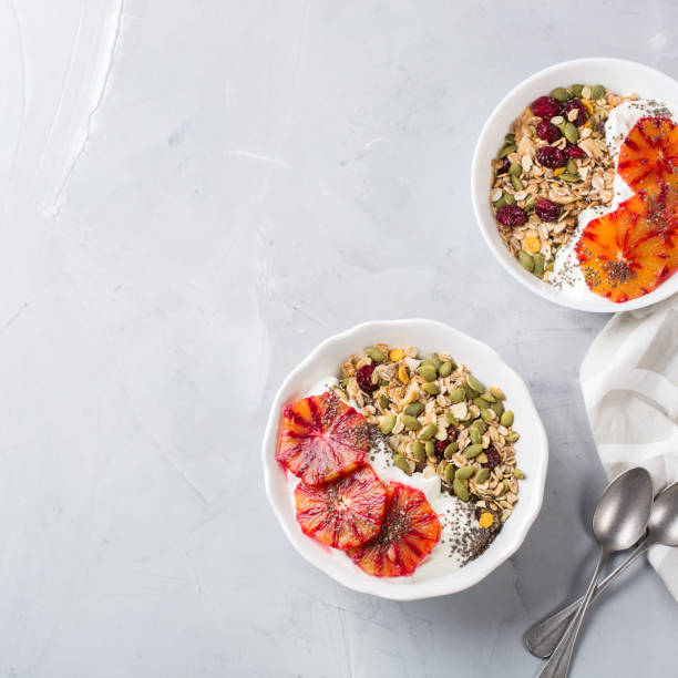 istock Healthy morning breakfast with granola yogurt blood oranges 927610700