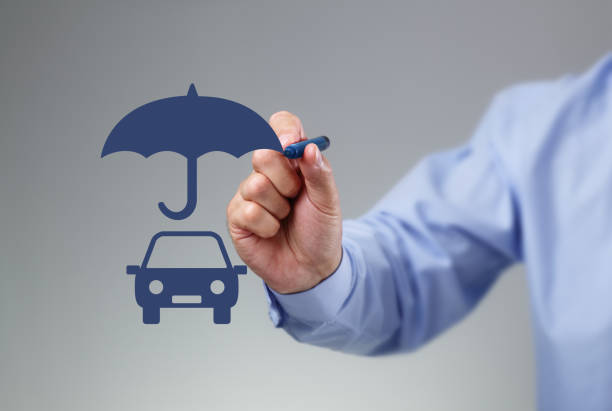 Car insurance Businessman hand drawing an umbrella above a family car concept for car insurance, protection, security and finance car insurance photos stock pictures, royalty-free photos & images