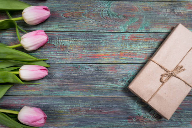 istock Border of fresh pink spring tulips arranged in a row 927617316