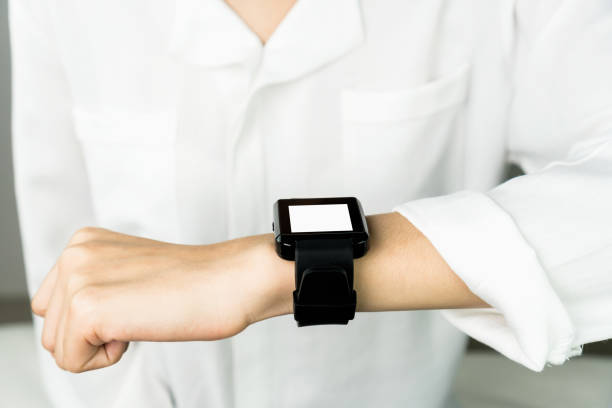 istock Woman using a digital clock in the display and technology advances in communication. This is a new technology. That makes life more comfortable. 927626428