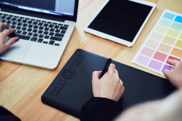 istock Businessman is working with a computer graphic designer. and color chart. 927626674