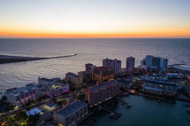 Aerial sunset photo of Clearwater Beach Florida resorts and condominiums cinlet
