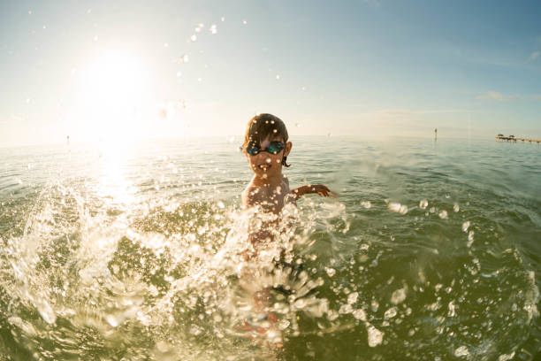 istock Mischievous boy splashes you in Clearwater, Florida 927641206