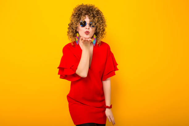 istock Attractive woman with short curly hair 927641790