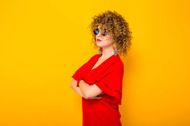 istock Attractive woman with short curly hair 927641812