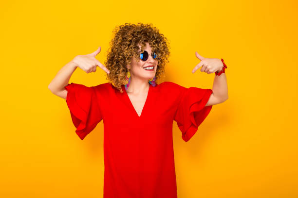 istock Attractive woman with short curly hair 927642940
