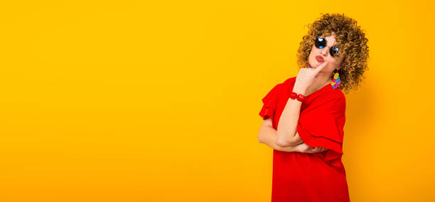 istock Attractive woman with short curly hair 927643562