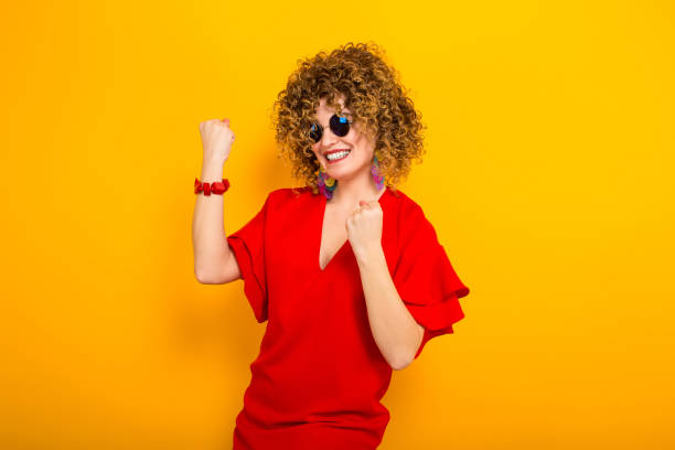 istock Attractive woman with short curly hair 927643642