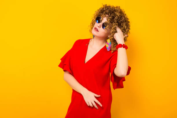 istock Attractive woman with short curly hair 927643920