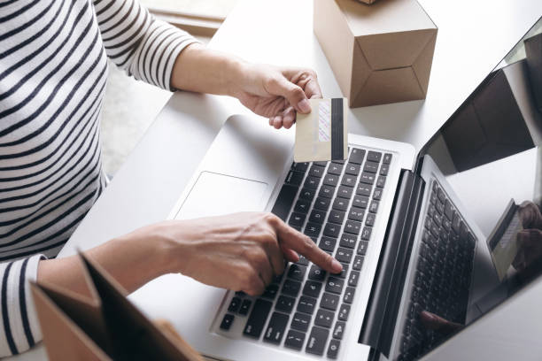 istock Woman's hands using credit card register and payments online shopping and customer service network connection market, using technology on laptop, Internet Online shopping or internet banking concept 927650962