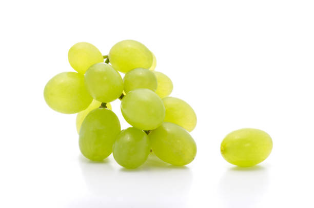 istock Ripe bunch green grapes isolated on the white background 927655336