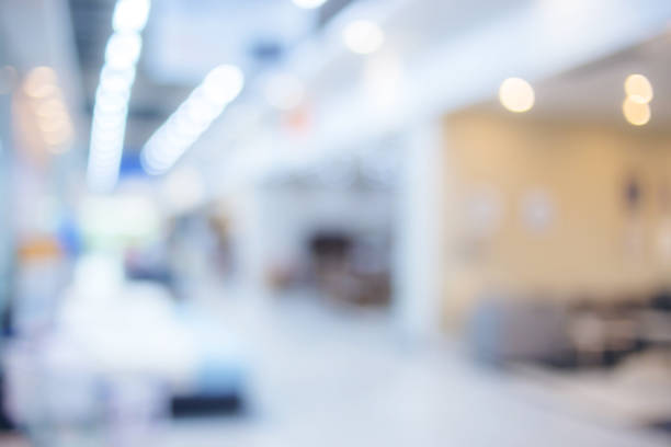 istock blur image background of shopping mall 927656118