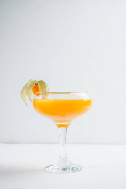 istock Sweet cocktail with peach liquor and physalis 927656656