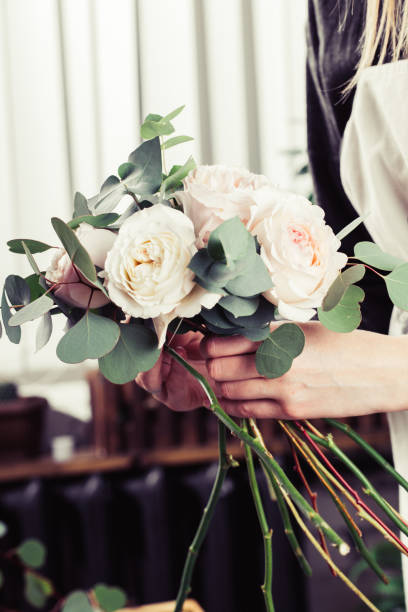 istock Pink roses in brides flower bouquet 927659762