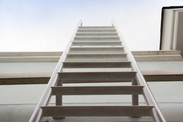 istock fire exit ladder  of house, steel ladder 927667570